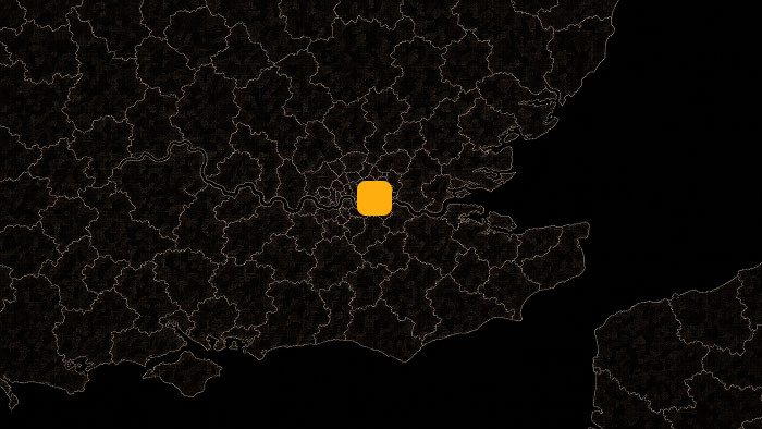 Dark map of southeastern England with an orange square marker highlighting a central location.