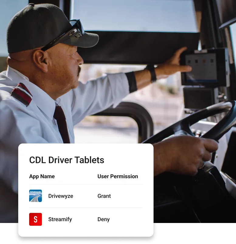 Driver inputting information into built-in tablet before beginning his drive.