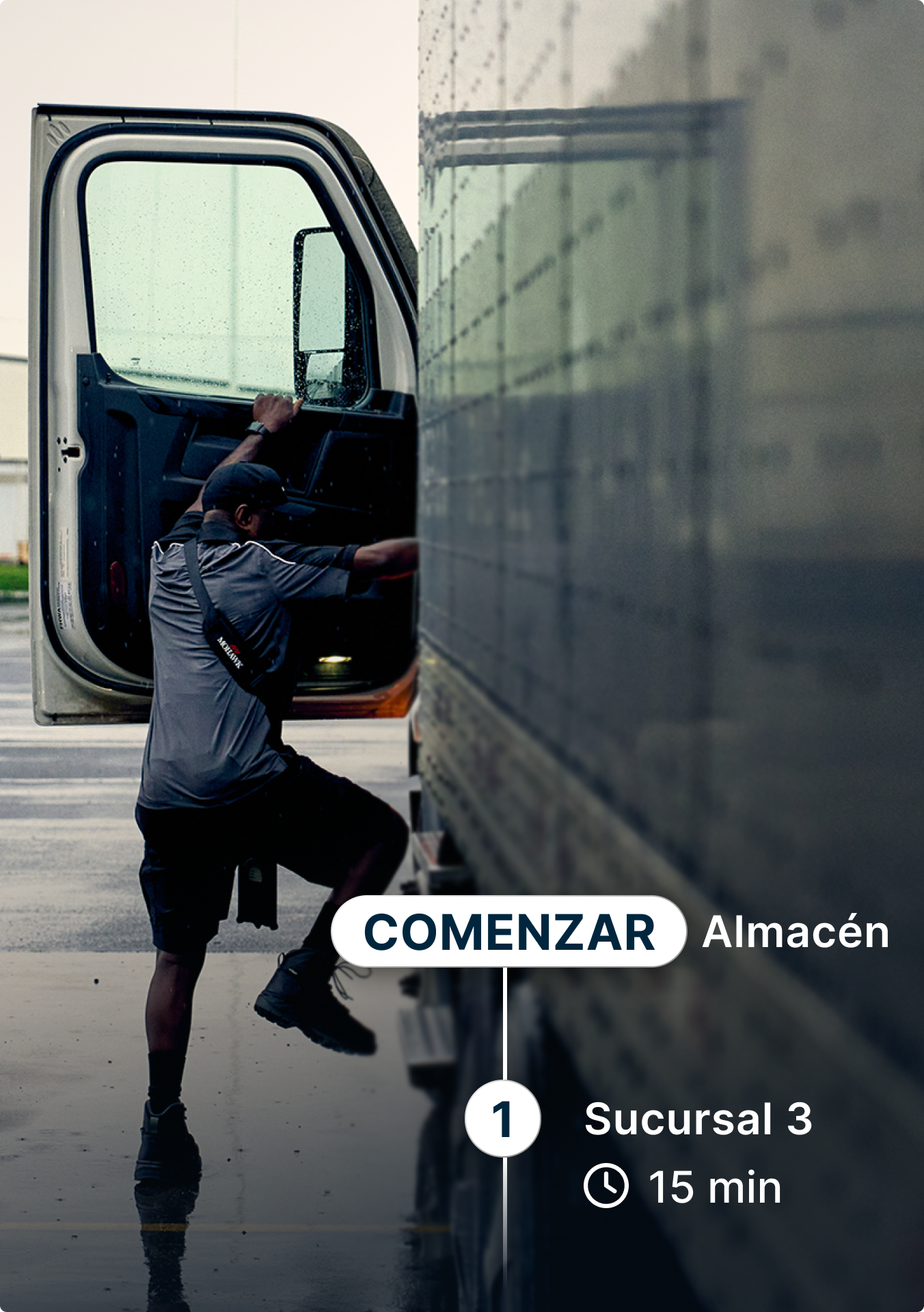 Conductor sube a la cabina con interfaz de navegación de la ruta de Warehouse a patio de maniobras de Hayward a 15 minutos.