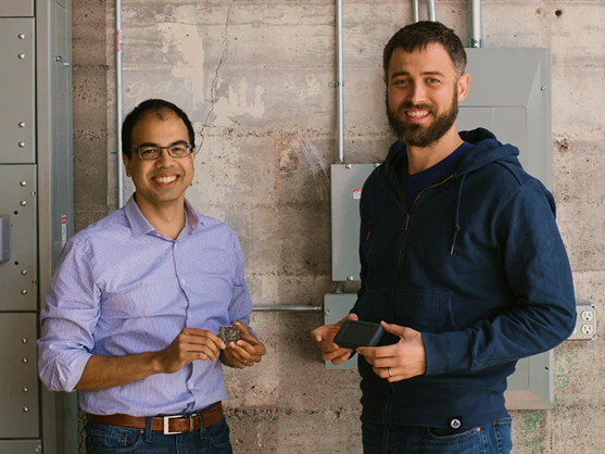 Samsara founders standing in an industrial workspace