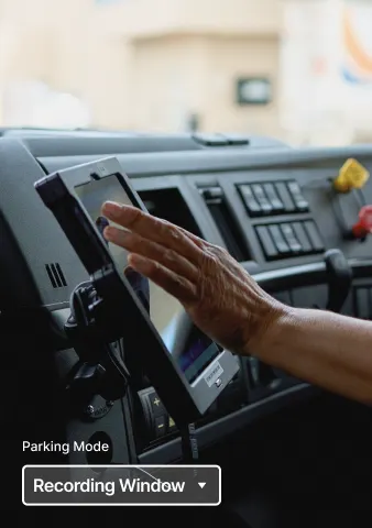 A driver selecting the parking mode recording window