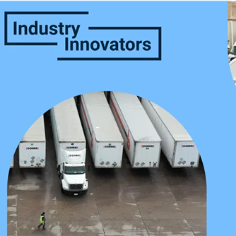 Aerial view of five white semi-trucks lined up at a loading dock with "Industry Innovators" text on blue background.