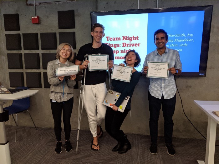 Tonia, Zack, Joy, and me celebrating our Hacksara win.