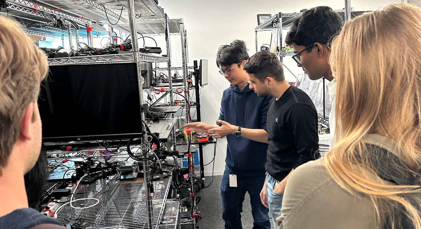 a group of interns viewing various samsara hardware