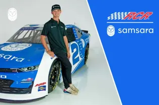 RCR and Samsara partnership showing Jesse Love leaning on Samsara branded race car