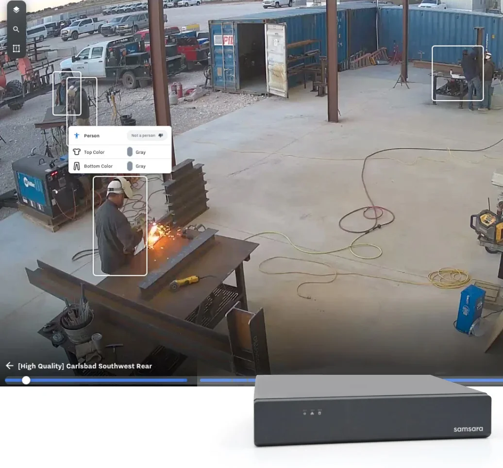A view of a worker on a job site using a welding tool. Samsara’s site cams are overlaid on the image.