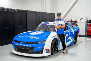 Jesse Love leaning on Samsara branded Nascar car number 2