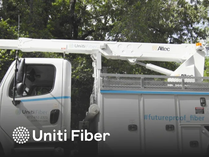 Uniti Fiber truck drives by safely on everyday route.