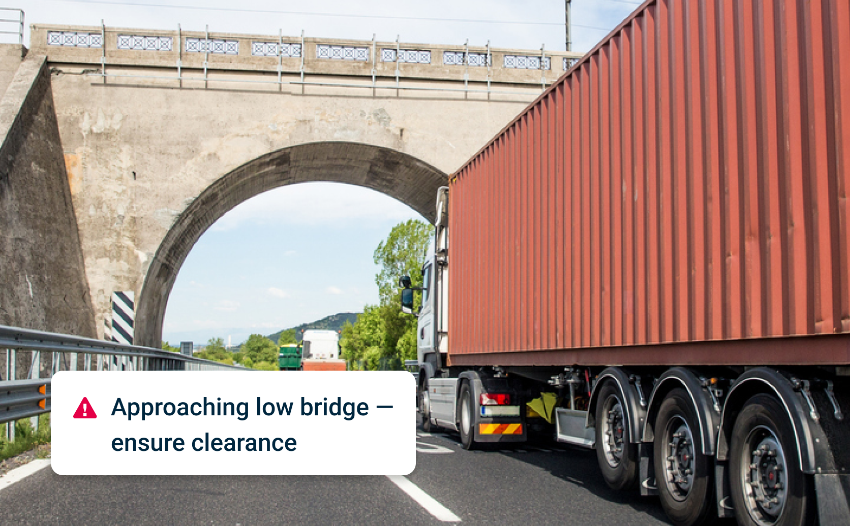 Truck approaching low bridge