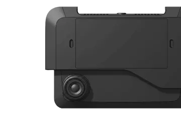 Black dash cam device with a wide-angle lens, shown in close-up against a white background.