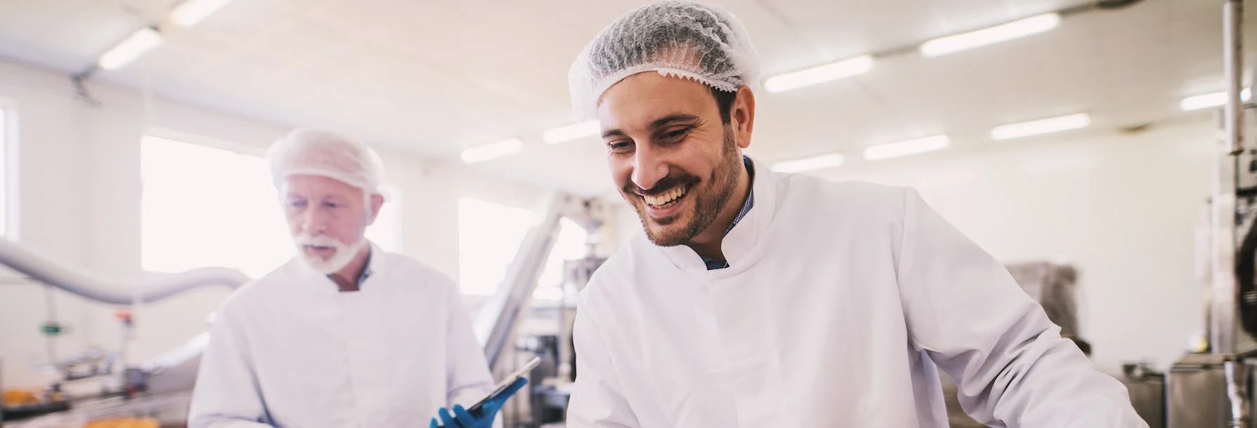 Workers conducting a food safety inspection