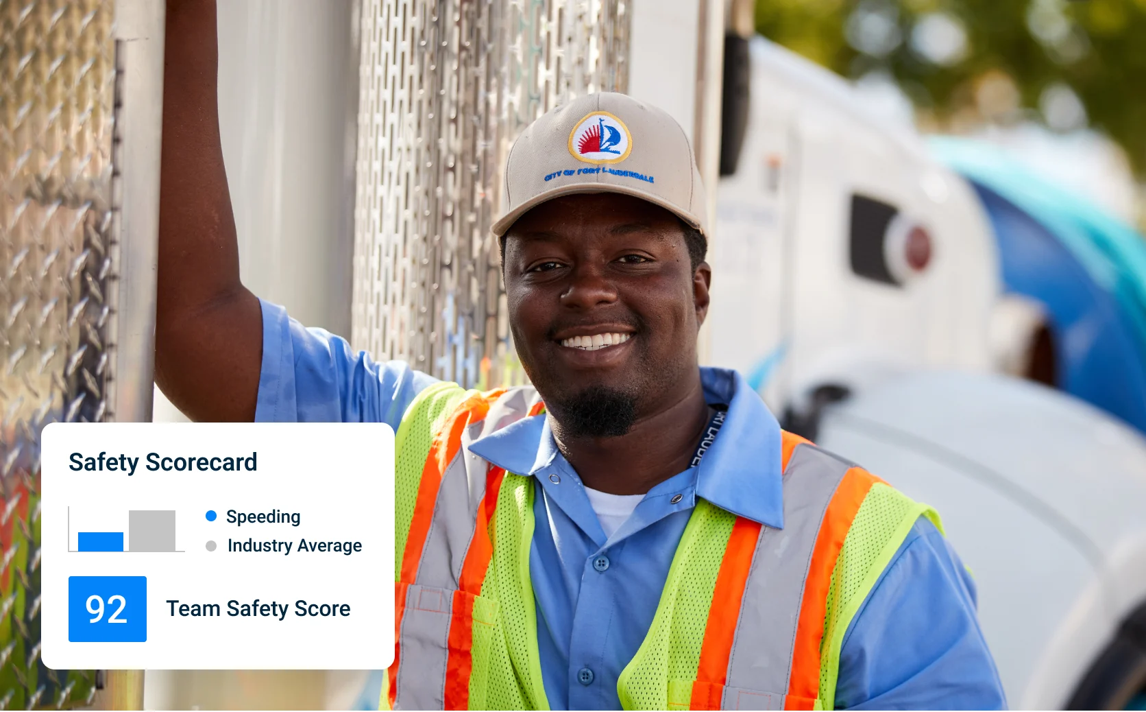 Smiling employee in yard. Overlay of safety scorecard with employee’s speeding vs. industry average and team safety score.