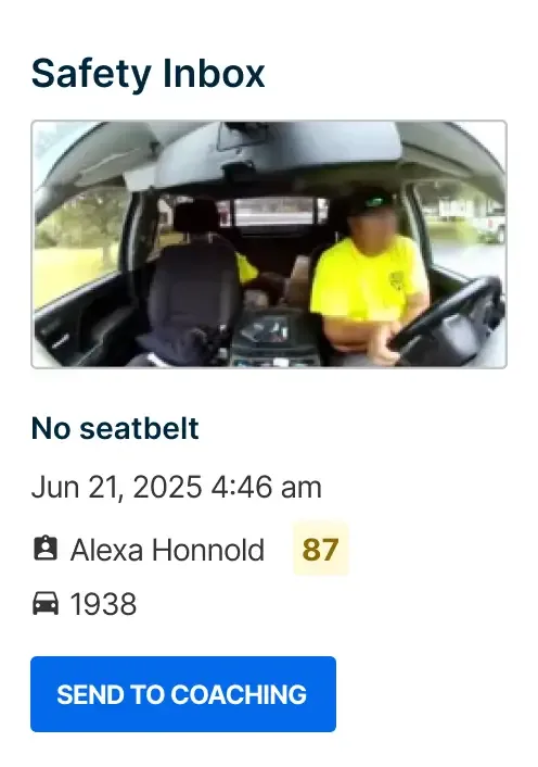 Interior view of vehicle with driver in bright yellow shirt not wearing seatbelt, labelled Safety Inbox with coaching option