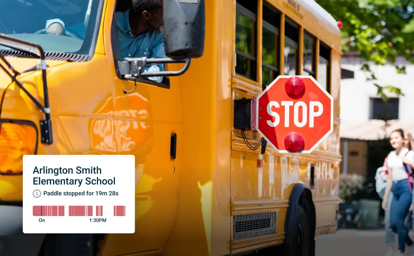 School bus with stop sign out with Samsara software screenshot superimposed on top