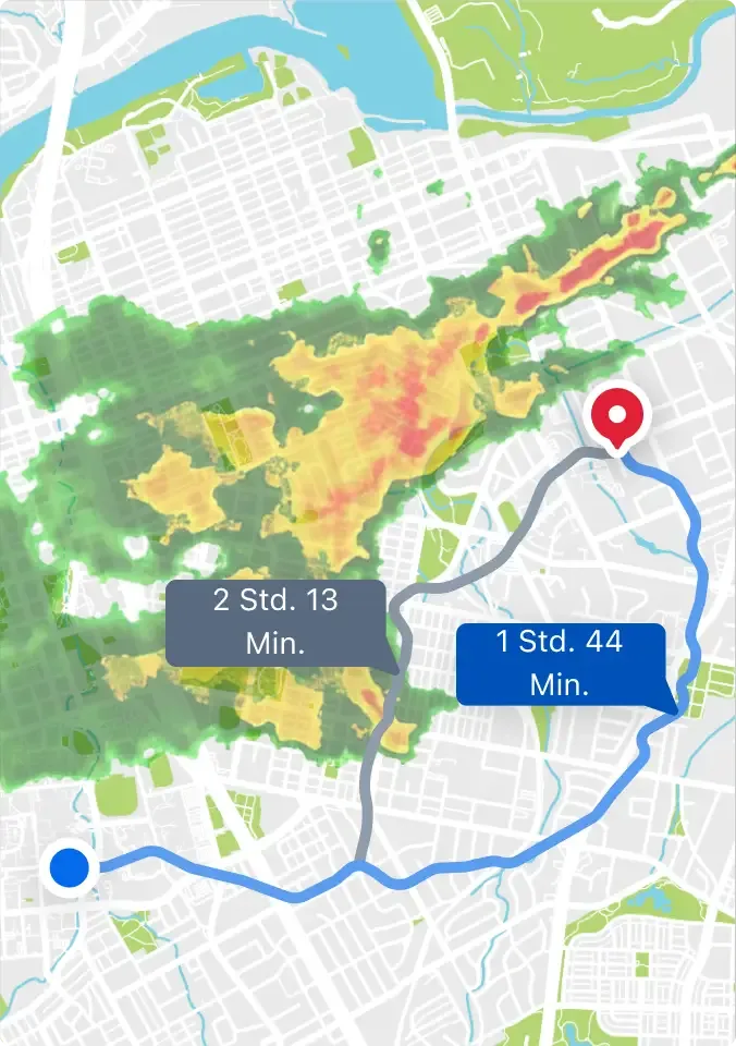 Karte zeigt zwei Routenoptionen rund um ein Heatmap-Gebiet, mit Reisezeiten von 2 Stunden 13 Minuten und 1 Stunde 44 Minuten.