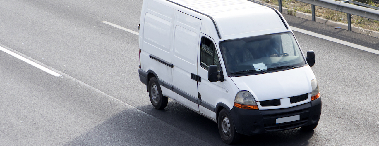 Truck on a road. On one side says trip completed and below a dual camera recording