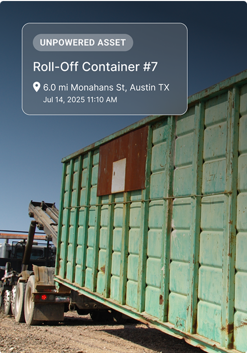 Green roll-off container #7 on truck bed with location details showing unpowered asset status in Austin, TX.