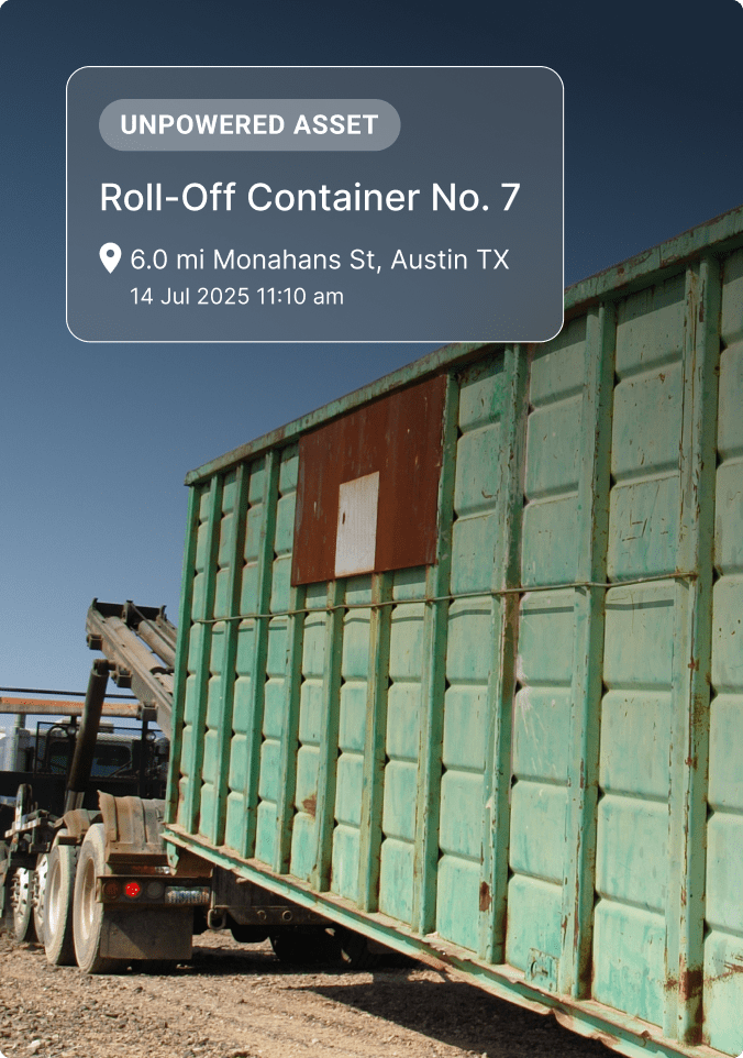Green roll-off container #7 on truck bed with location details showing unpowered asset status in Austin, TX.