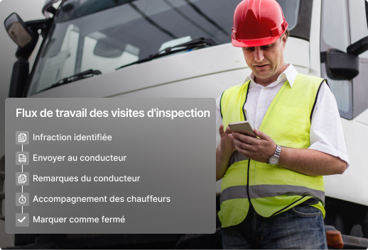 Ouvrier du BTP casqué en gilet haute visibilité vérifiant les étapes du flux de travail sur un smartphone, près d’un camion.