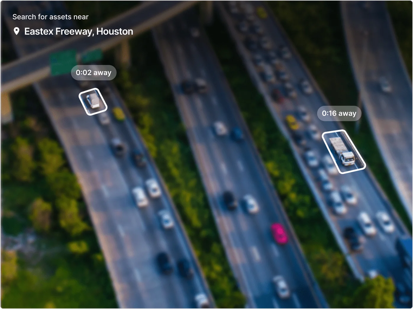 Aerial view of Eastex Freeway in Houston with traffic lanes, and distance markers showing 0:02 and 0:16 away.