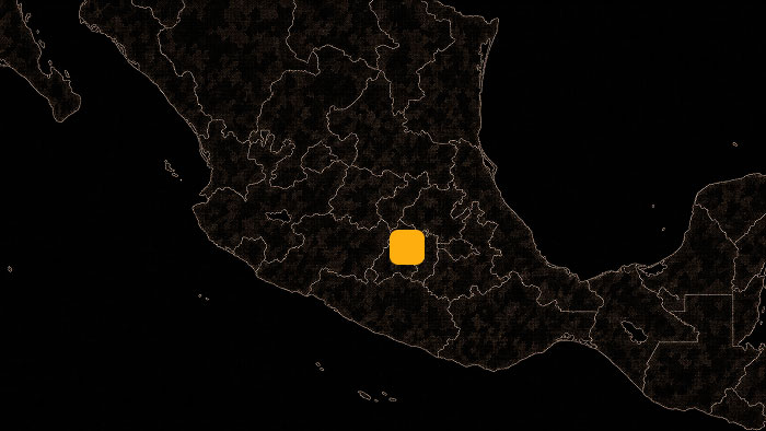 Dark map of Mexico with an orange square marker highlighting a central region location.