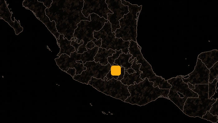 Dark map of Mexico with an orange square marker highlighting a central region location.