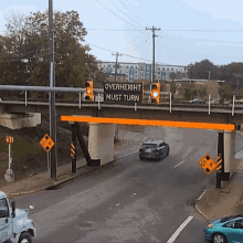 Low bridge pulling roof off of truck