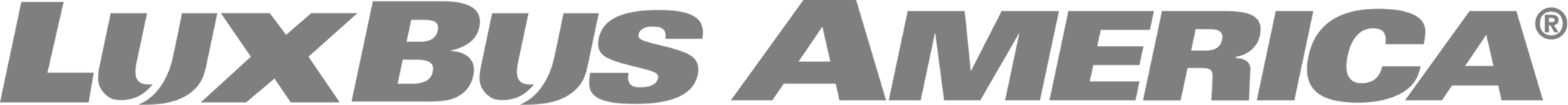 LuxBus America logo in bold gray italic letters with a registered trademark symbol.