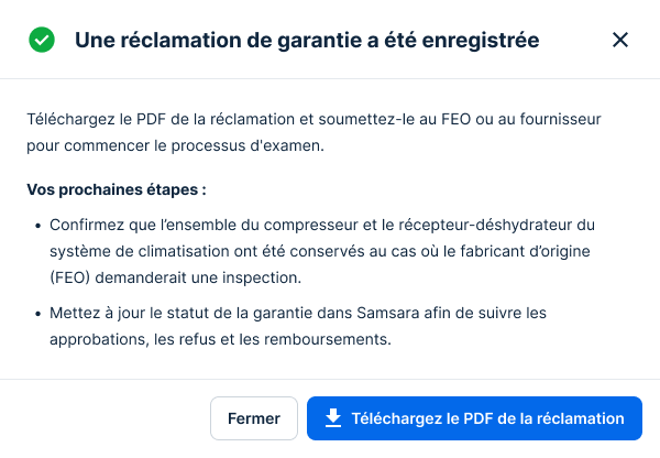 A success dialog in Spanish confirming a warranty request was created, with next steps and a blue download PDF button.