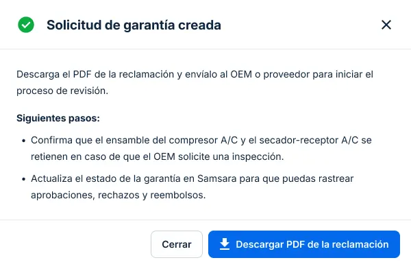 Ventana emergente con mensaje de confirmación "Solicitud de garantía creada" con pasos a seguir y botón para descargar PDF.