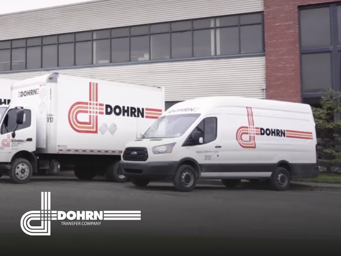 Dorhn branded trucks sit in parking lot waiting to be  utilized.