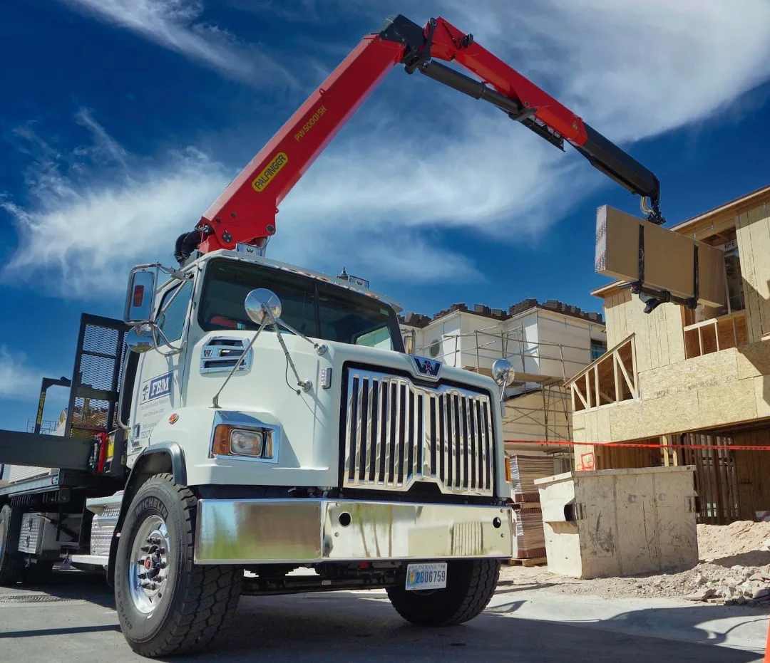 Foundation Building Materials truck making a delivery.