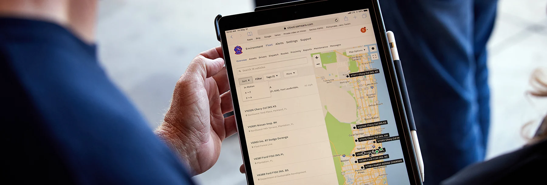 Samsara Customer Looking at Dashboard on Tablet