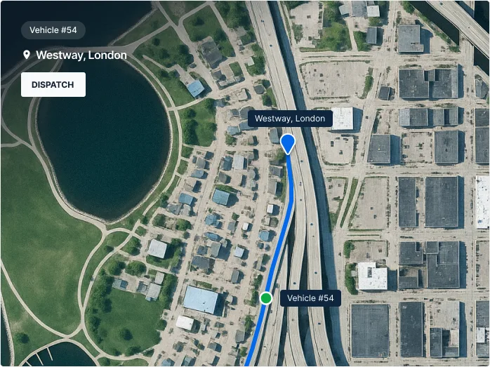 Aerial map showing Vehicle #54 location on Westway, London, with navigation route and nearby lake and buildings.