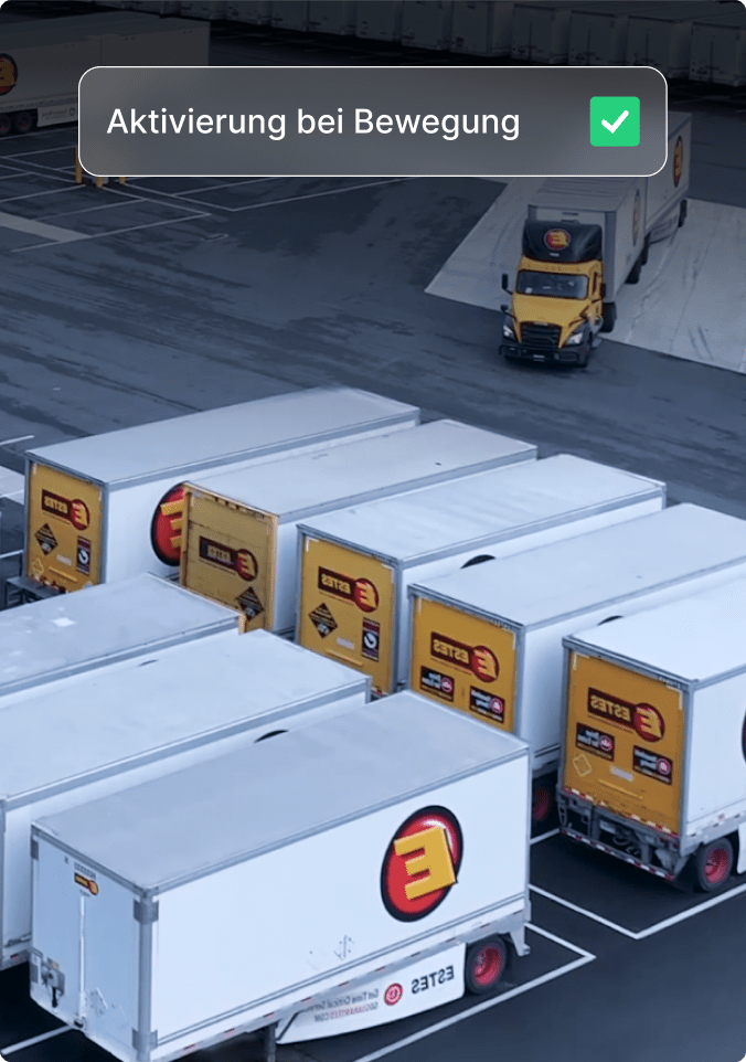 Lieferwagen auf dem Parkplatz mit einer mobilen App, die aktivierte Benachrichtigungsoptionen anzeigt.