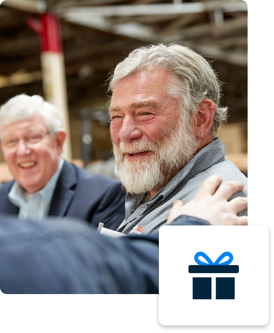 Man getting pat on shoulder