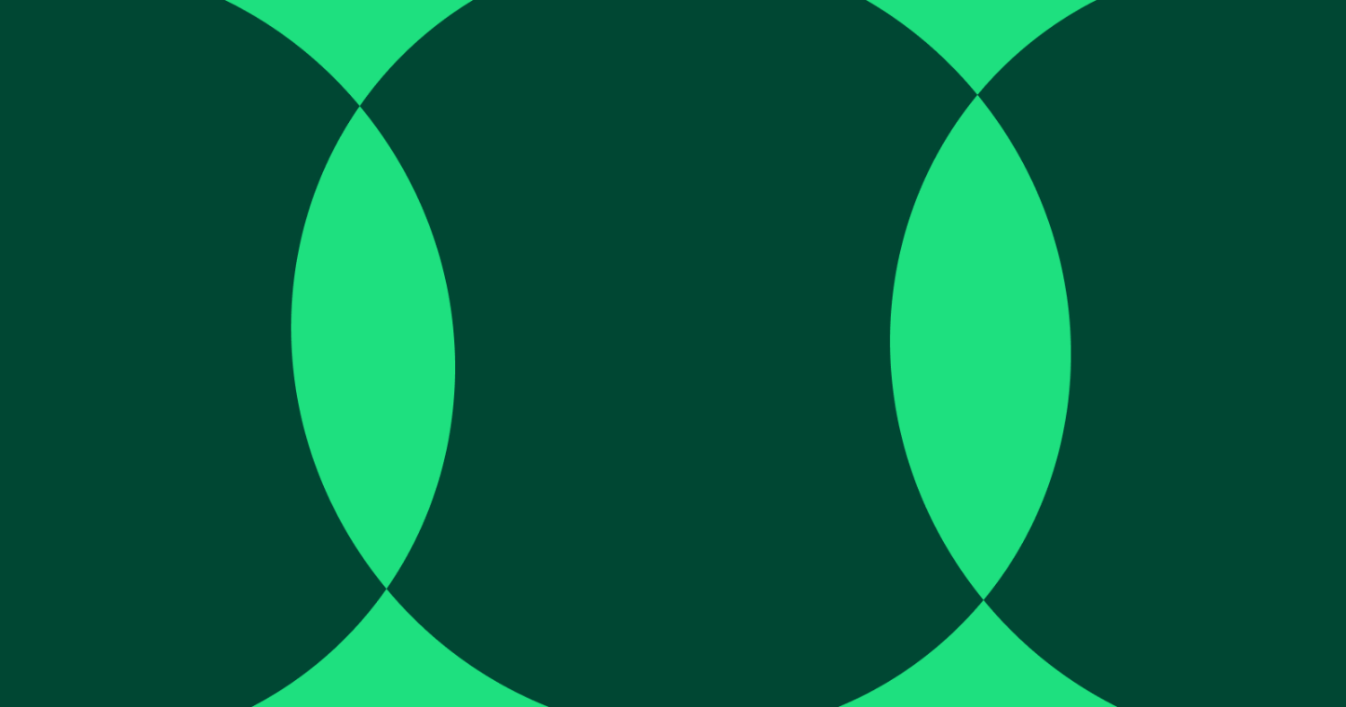 Three Dark Green Overlapping Circles Against a Lighter Green Background