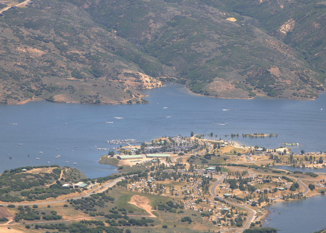 “Long-distance, high-angle photograph of a neighborhood built on a peninsula” - Source: Canva