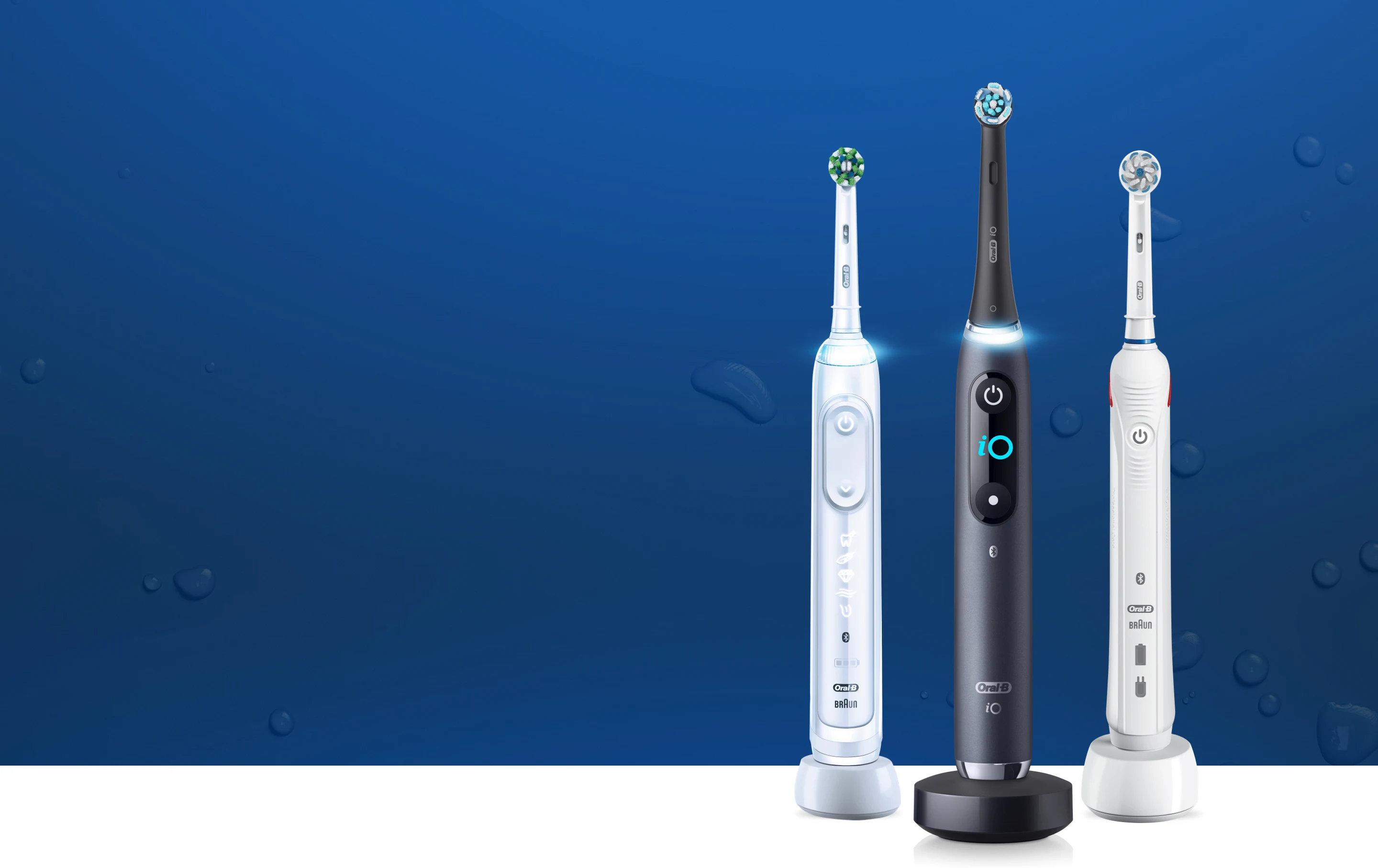 Kolme Oral-B-sähköhammasharjaa sinisellä taustalla. undefined