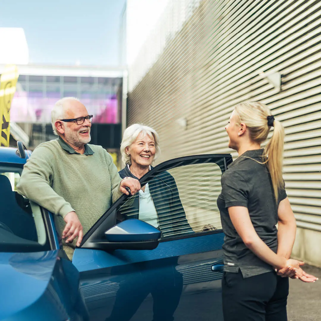 Older couple outside a car  1080x1080px