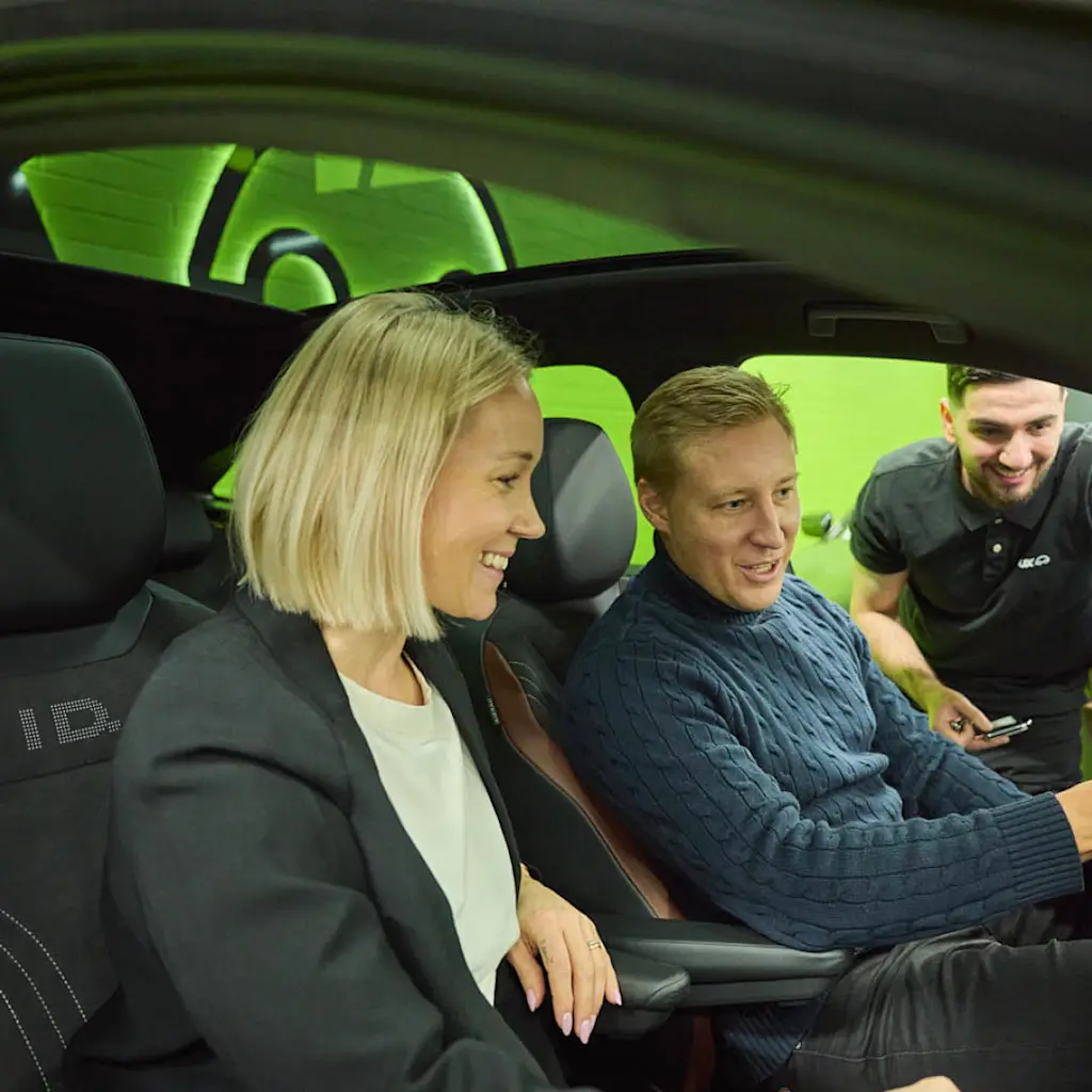 Couple in an electric car 1080x1080px