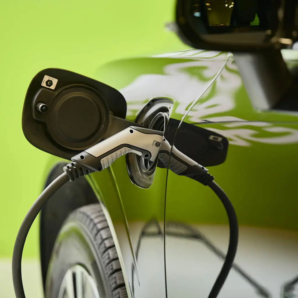 an electric car that charges 1080x1080px