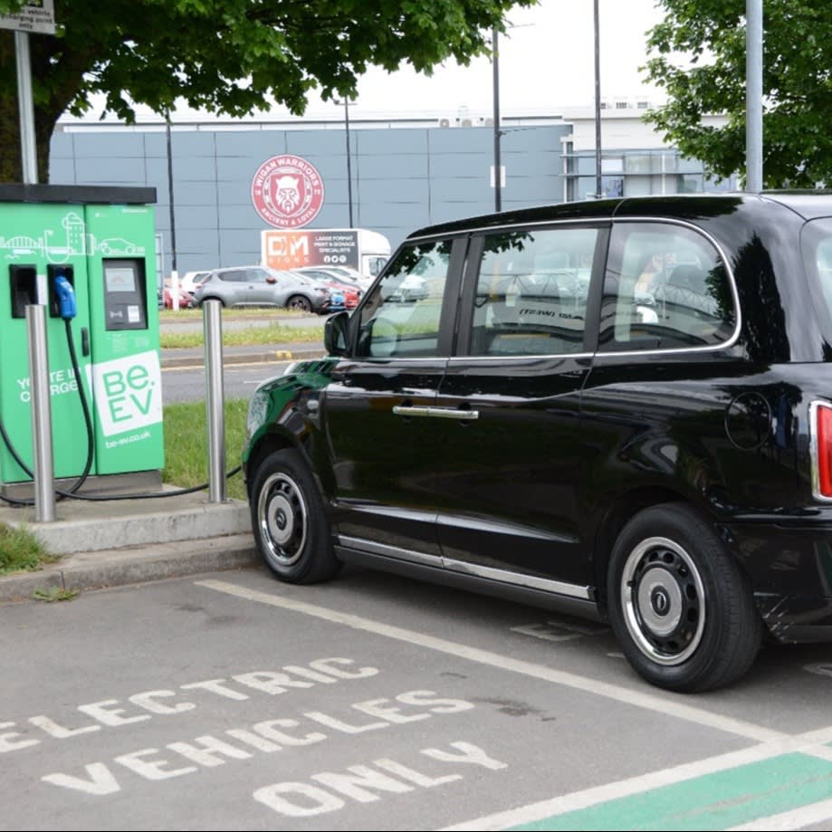 Electric taxi at a charging point