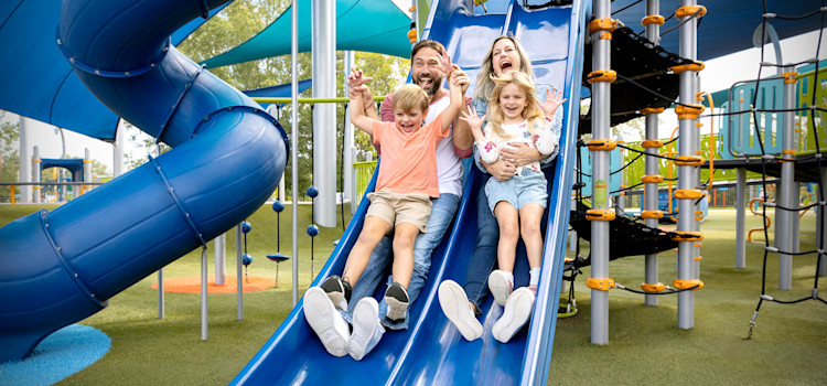 Family enjoying LeFleur's Bluff Playground – Jackson, MS