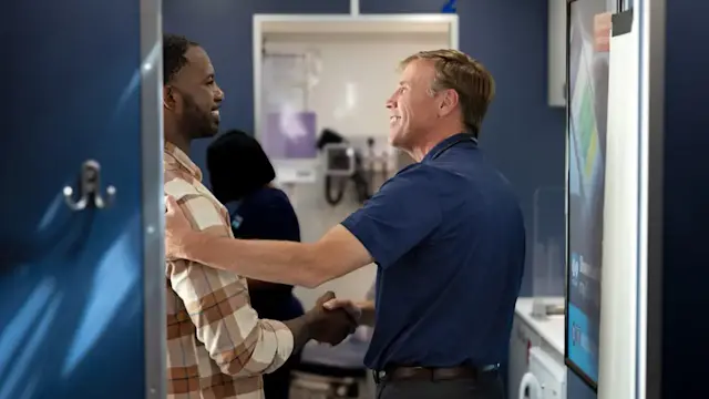 Dr. Lee Greer, BCBSMS Chief Medical Director, welcoming a patient on BlueHealth Mobile – Mississippi Delta