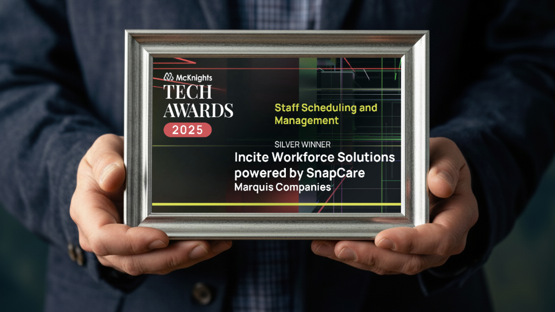 Hands holding McKnight’s Tech Awards 2025 Silver Winner plaque for Staff Scheduling and Management, honoring Incite Workforce Solutions powered by SnapCare.