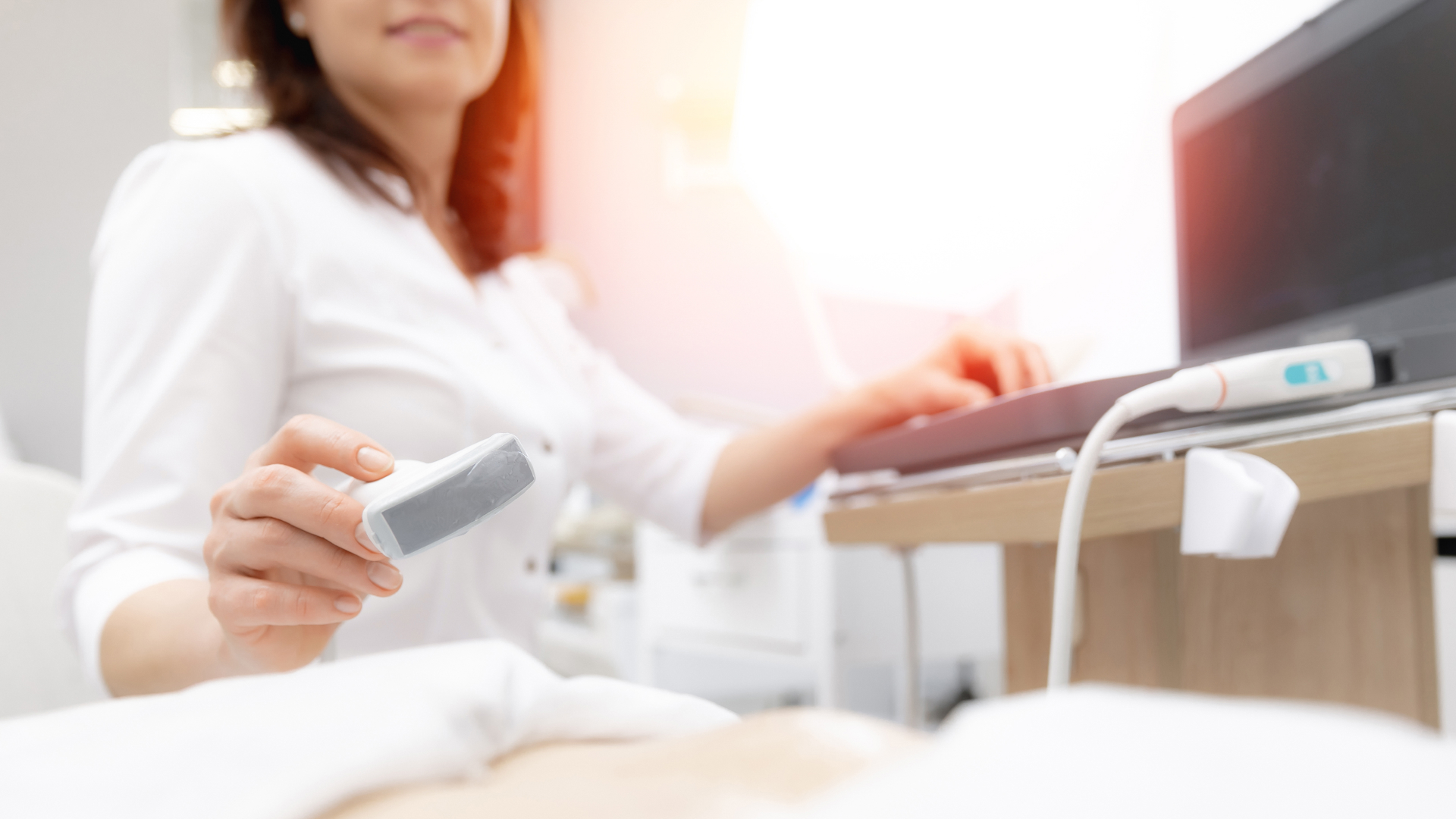 Ultrasound technologist performing a scan