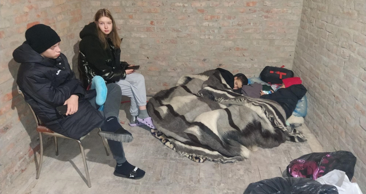 Children and families from Ukraine hide in bomb shelters. 