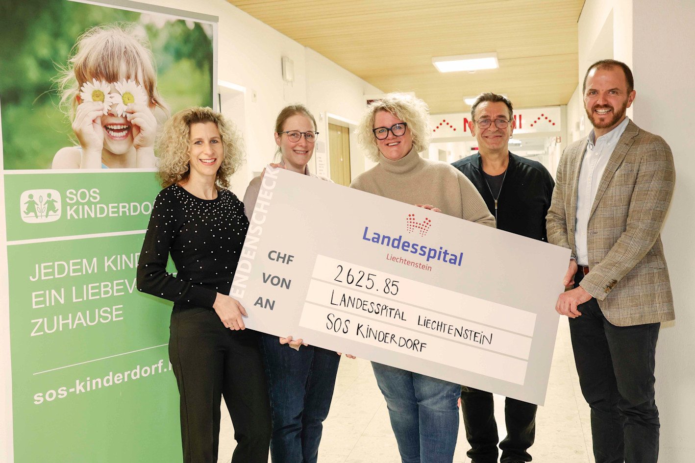 Handover of check to Liechtenstein State Hospital