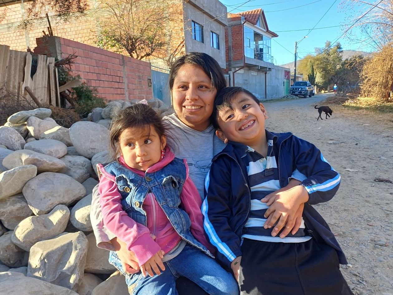 A Bolivian mother with her two children